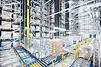 High-bay warehosue with storage and retrieval machine Exyz